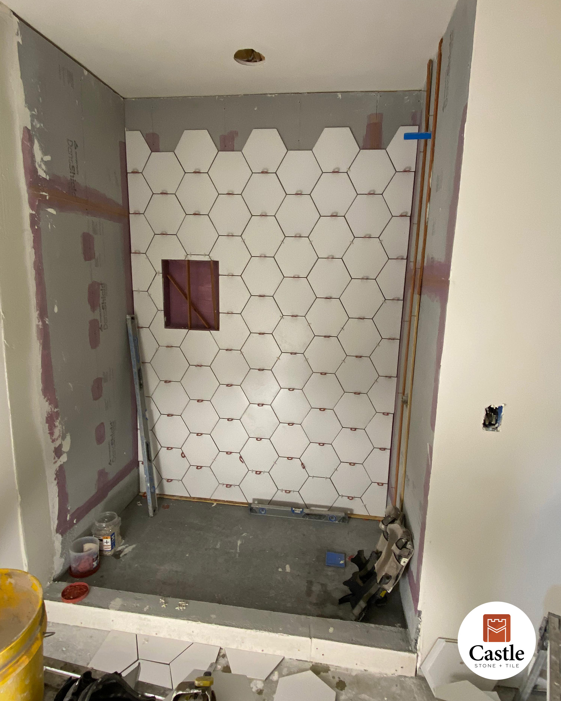 bathroom shower is white hexagon ceramic in Jamul CA 1