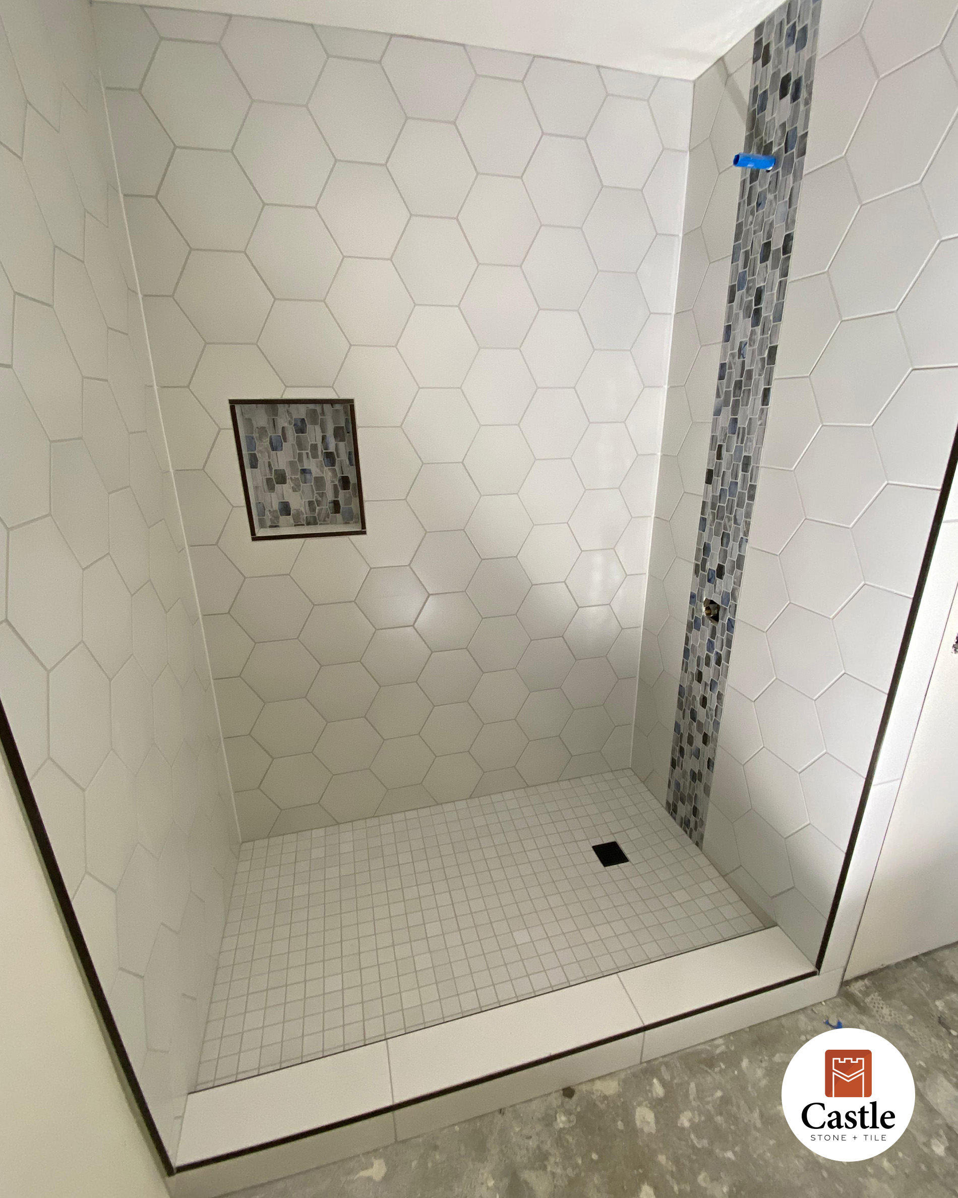bathroom shower is white hexagon ceramic in Jamul CA 3